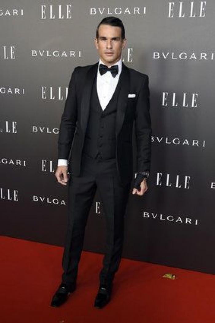 Sara Carbonero enseña pierna, escote y tatuaje en la fiesta Elle (FOTOS)