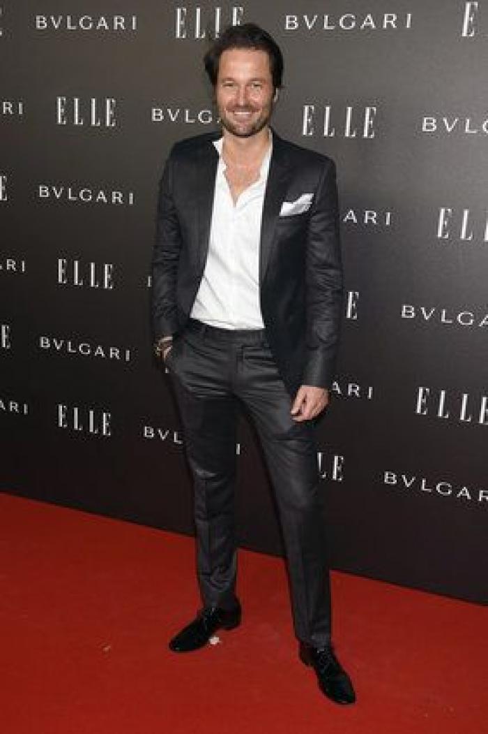 Sara Carbonero enseña pierna, escote y tatuaje en la fiesta Elle (FOTOS)