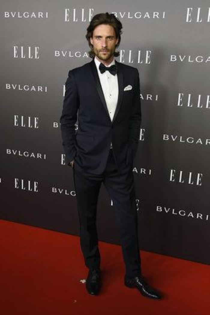 Sara Carbonero enseña pierna, escote y tatuaje en la fiesta Elle (FOTOS)