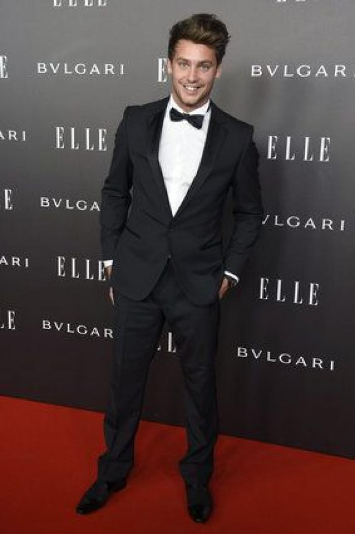 Sara Carbonero enseña pierna, escote y tatuaje en la fiesta Elle (FOTOS)