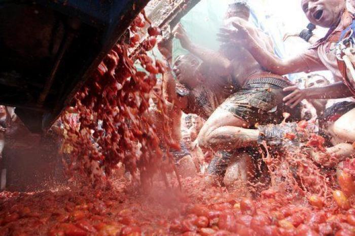 Bañados en tomate: las mejores fotos de la Tomatina 2016
