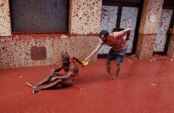 Bañados en tomate: las mejores fotos de la Tomatina 2016
