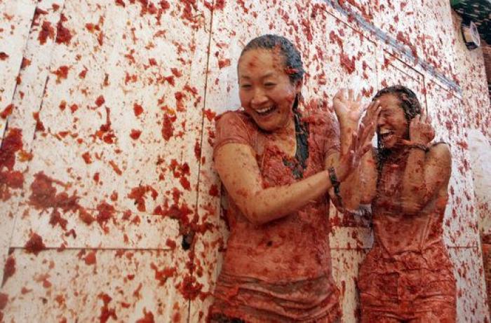 Bañados en tomate: las mejores fotos de la Tomatina 2016