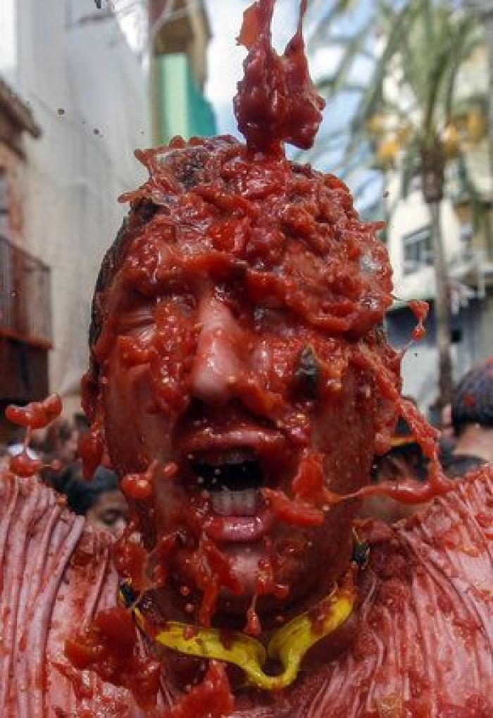 Bañados en tomate: las mejores fotos de la Tomatina 2016