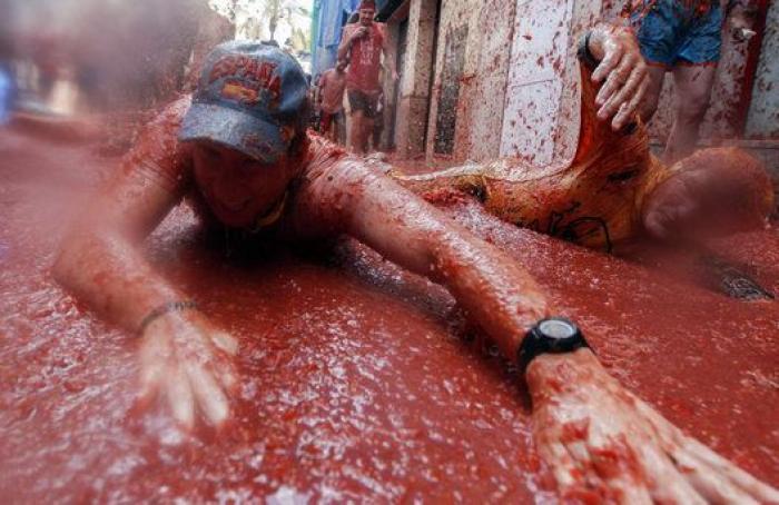 Bañados en tomate: las mejores fotos de la Tomatina 2016