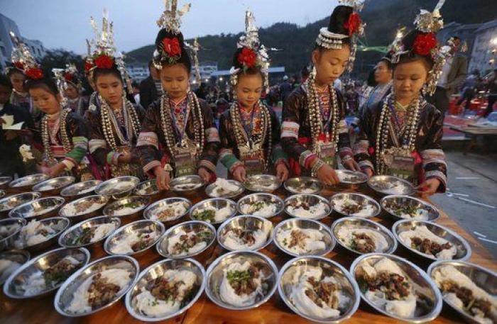 Las rosquillas de San Isidro, el aniversario del 15M y otras fotos del viernes