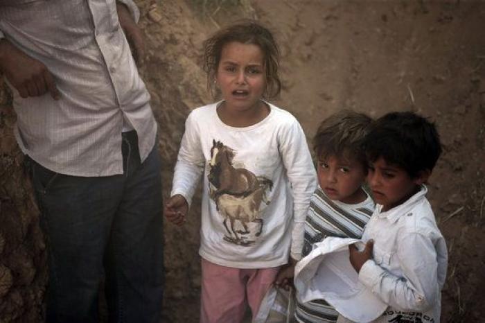 Las duras imágenes de miles de sirios intentado huir a Turquía (FOTOS)