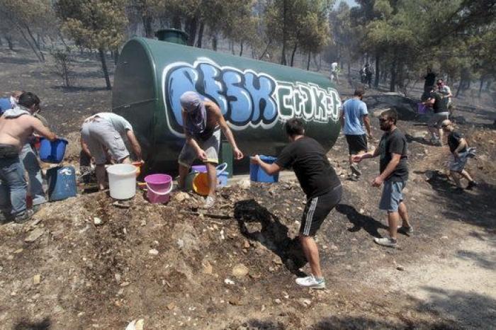 Cuatro incendios siguen activos en Grecia, uno de ellos en Atenas