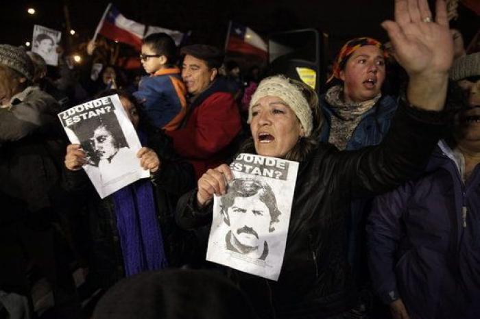 Chile, entre la frustracion y la fiesta por la muerte del torturador Contreras (FOTOS)