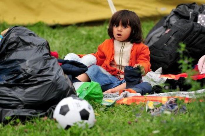 Los refugiados, más de 21.000 en tres días, llegan a Croacia a través de campos de maíz