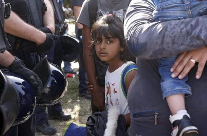 Los refugiados, más de 21.000 en tres días, llegan a Croacia a través de campos de maíz