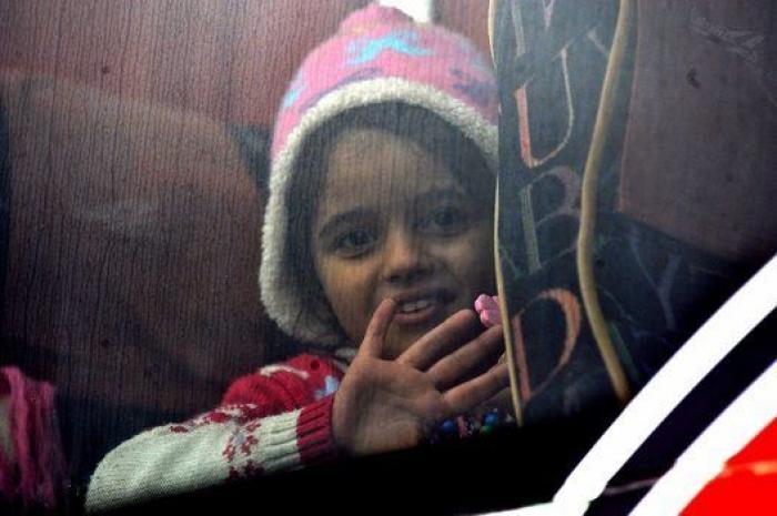 La lluvia y el frío complican el éxodo de los refugiados (FOTOS)