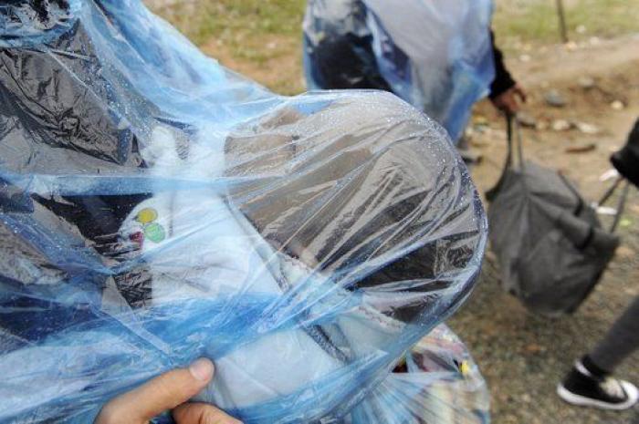 La lluvia y el frío complican el éxodo de los refugiados (FOTOS)