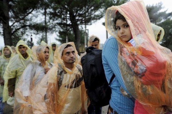 La lluvia y el frío complican el éxodo de los refugiados (FOTOS)