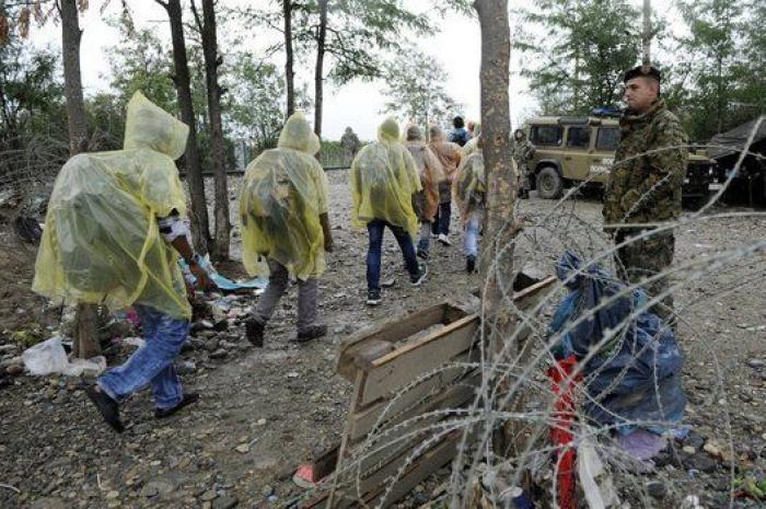 La lluvia y el frío complican el éxodo de los refugiados (FOTOS)