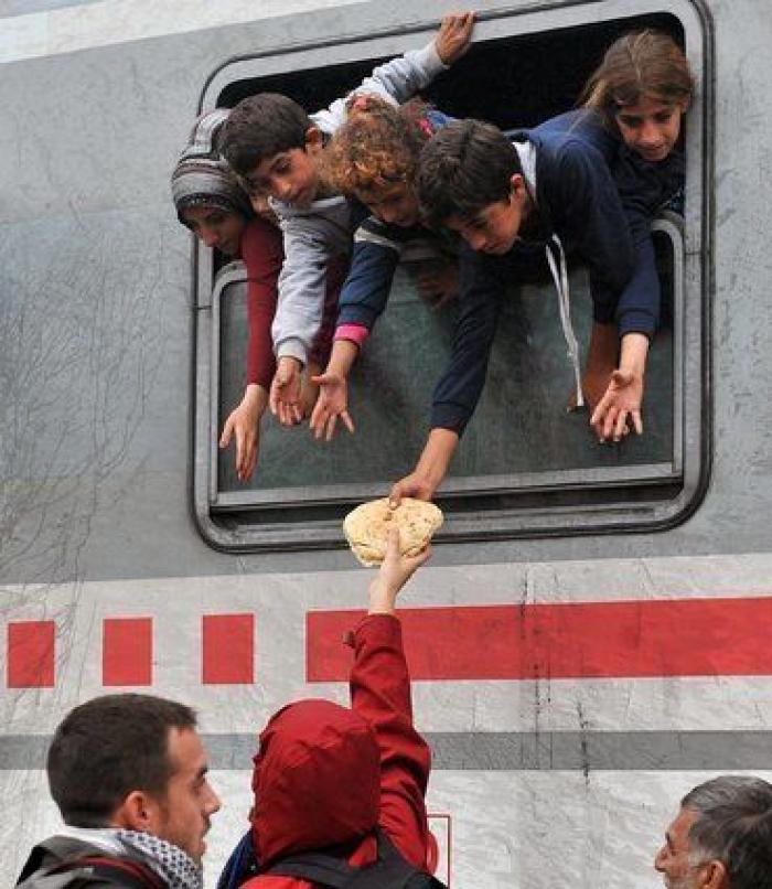 La lluvia y el frío complican el éxodo de los refugiados (FOTOS)