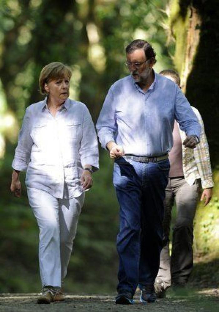 Merkel y Rajoy, de paseo por el Camino de Santiago