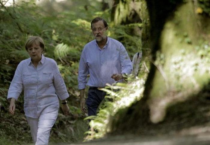 Merkel y Rajoy, de paseo por el Camino de Santiago