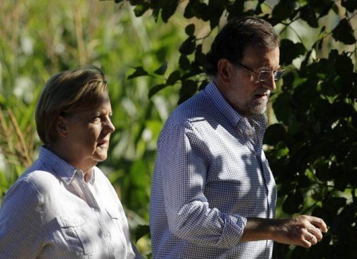 Merkel y Rajoy, de paseo por el Camino de Santiago