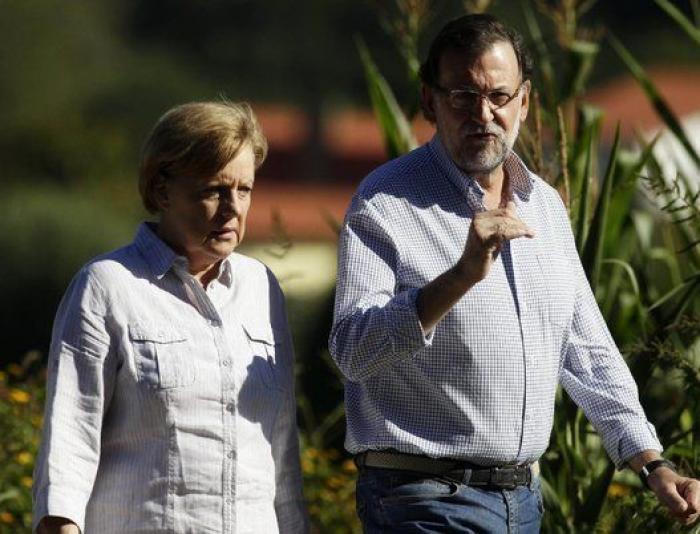 Merkel y Rajoy, de paseo por el Camino de Santiago