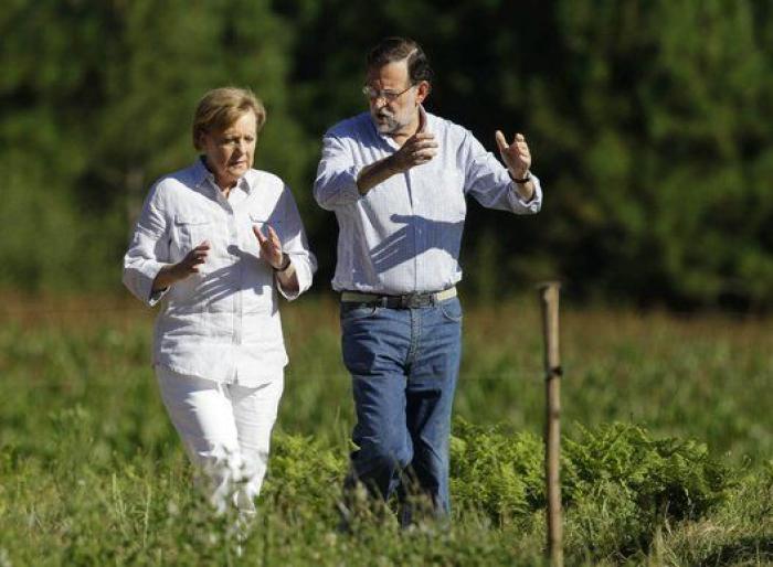 Merkel y Rajoy, de paseo por el Camino de Santiago