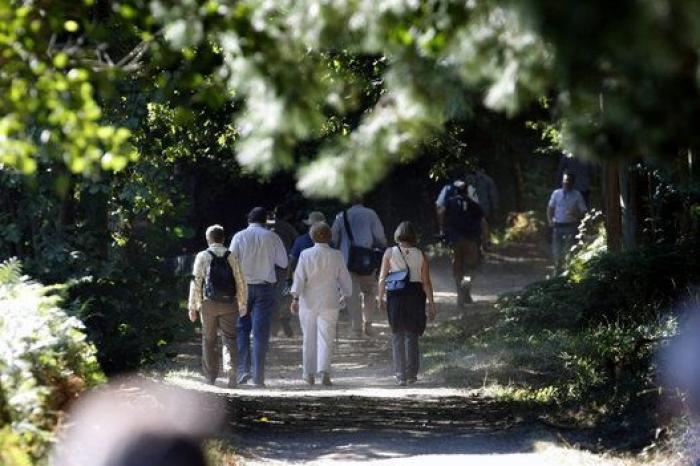 Merkel y Rajoy, de paseo por el Camino de Santiago
