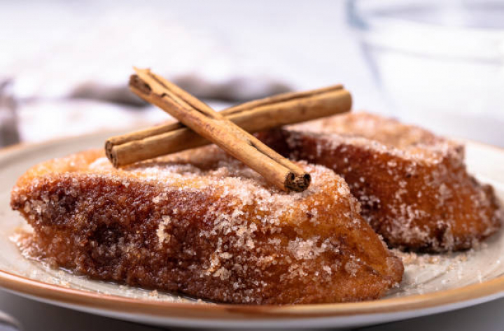 alt="alt="Close up of easter torrijas on table""