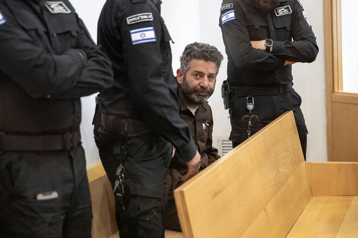 BEERSHEBA, ISRAEL - MAY 06: Global Sumud Flotilla activists, Brazilian national Thiago Avila (not seen) and Spanish national of Palestinian origin Saif Abu Keshek (C) appear before the court in Beersheba, Israel on May 06, 2026. (Photo by Mostafa Alkharouf/Anadolu via Getty Images)