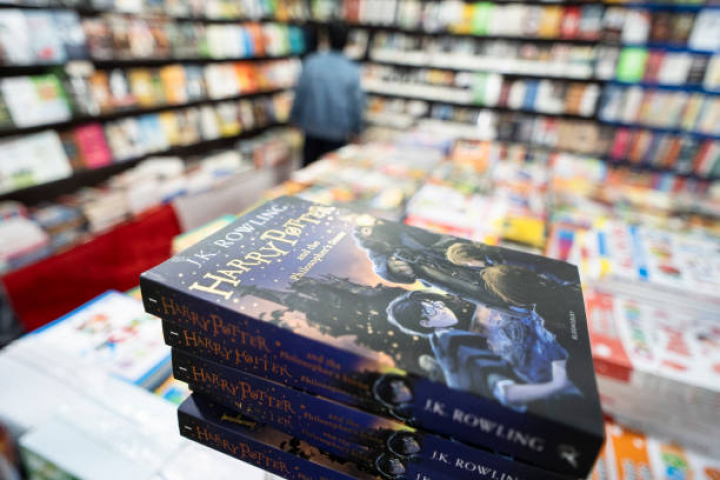 alt="alt="The best-selling book ''Harry Potter'' is being displayed for sale at a stall during the Assam Book Fair in Guwahati, Assam, India, on December 29, 2023. (Photo by David Talukdar/NurPhoto via Getty Images)""