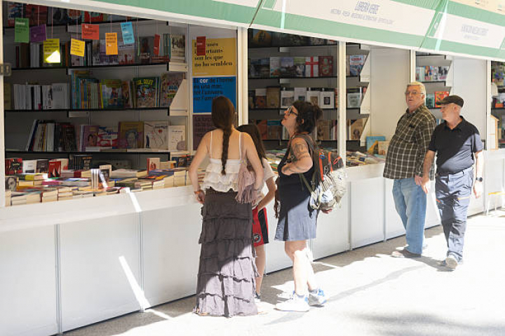 alt="alt="MADRID, SPAIN - MAY 29: Several people during the first day of the 85th edition of the Madrid Book Fair, in the Retiro Park, on 29 May, 2026 in Madrid, Spain. The 85th Madrid Book Fair will be held from 29 May to 14 June 2026 with 366 stands and a central theme of humour. This year's guest country is Romania and it will have its own programme and a prominent presence during the fair. (Photo By Eduardo Parra/Europa Press via Getty Images)""