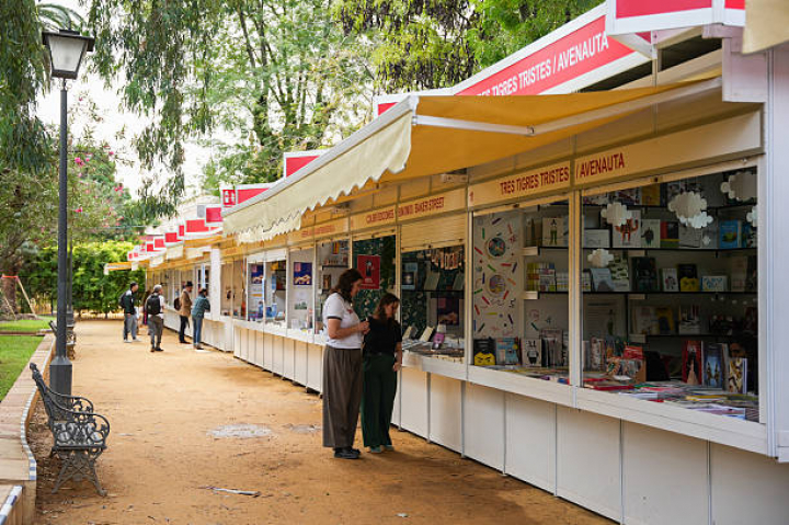 alt="alt="SPAIN - OCTOBER 27: Images of visitors at the Seville Book Fair (Felise). On October 27, 2025, in Seville (Andalusia, Spain). The Seville Book Fair (Felise) 2025 has closed its first weekend with 50,000 visitors, one of the best starts in its history despite the rains on Sunday. Felise celebrates this year its second edition in the Murillo Gardens of the Andalusian capital, a place that is not asphalted, which has caused the mud to be muddy due to the rains. (Photo By Maria Jose Lopez/Europa Press via Getty Images)""