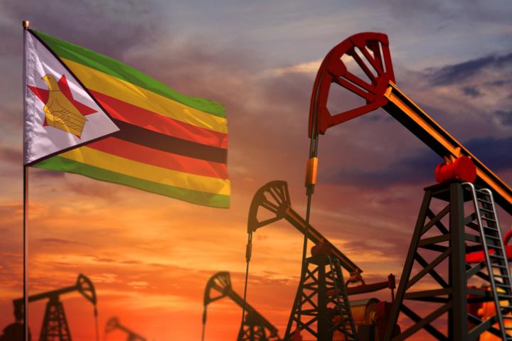 Ilustración de pozos petrolíferos con la bandera de Zimbabue ondeando.