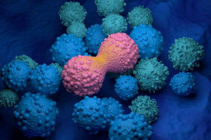 Ilustración de células cancerosas dividiéndose.