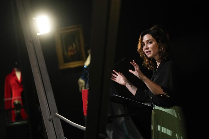 La presidenta de la Comunidad de Madrid, Isabel Díaz Ayuso, inaugura la muestra 'Lorenzo Caprile', un viaje por los vestidos más icónicos del modista, este martes, en la Sala Canal de Isabel II en Madrid.