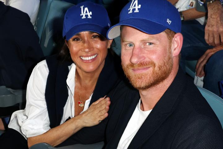 El príncipe Harry y Meghan Markle en un partido de béisbol entre los Toronto Blue Jays y Los Angeles Dodgers