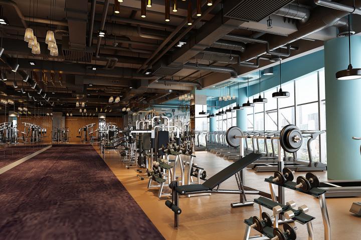 Un gimnasio con máquinas vacío.