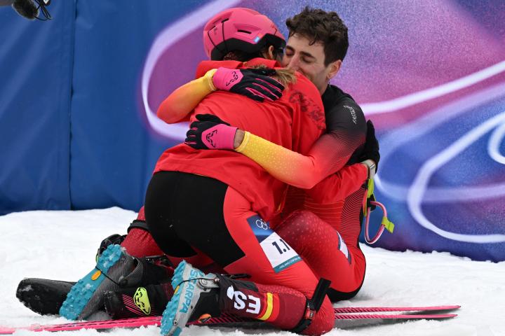 Milano Cortina 2026 Olympics - Ski Mountaineering - Mixed Relay - Stelvio Ski Centre, Bormio, Italy - February 21, 2026. Ana Alonso Rodriguez of Spain and Oriol Cardona Coll of Spain celebrate after winning bronze in the Mixed Relay REUTERS/Angelika Warmuth