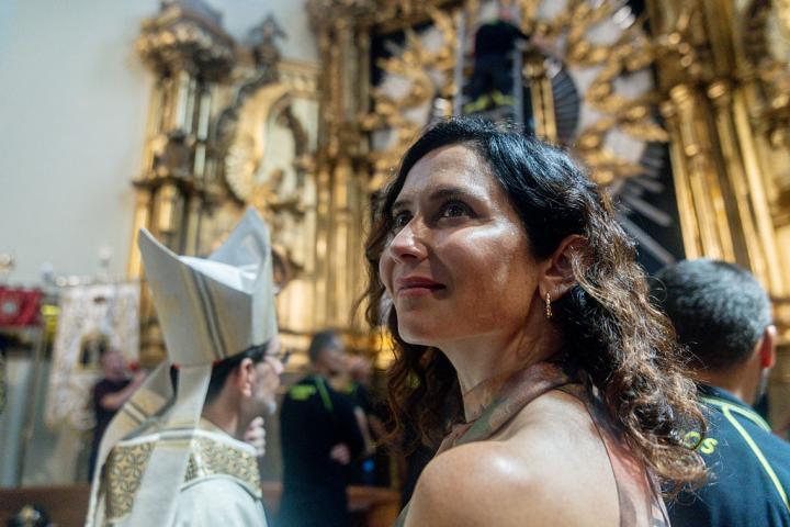 MADRID, SPAIN - AUGUST 15: The president of the Community of Madrid, Isabel Diaz Ayuso, during the lowering of the painting of the Virgen de la Paloma, in the Church of the Virgen de la Paloma, on 15 August, 2025 in Madrid, Spain. The Fiestas de la Paloma or Verbena de la Paloma is a summer celebration in honor of the Virgen de la Paloma, originally located in the old neighborhood of Calatrava, in the vicinity of Calle de Toledo and Plaza de la Cebada, in the central district of the city of Madrid. The Virgen de la Paloma, is considered the popular patron saint of the capital. (Photo By Ricardo Rubio/Europa Press via Getty Images)