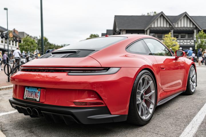 Chicago, Illinois - September 29, 2024: 2023 Porsche 911 GT3 Touring red color. Porsche 911 GT3 Touring parked on the street. corner view. Porsche 911 GT3 Touring in Chicago