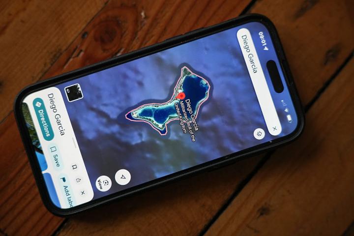 KNUTSFORD, UNITED KINGDOM - JANUARY 20: In this photo illustration, a phone shows the position of Island of Diego Garcia on Google maps after a post on Truth Social by U.S. President Donald Trump which criticises the UK's handover of the Chagos Islands on January 20, 2026 in Knutsford, United Kingdom. The United States had previously assented to the UK handing over the sovereignty of the Chagos Islands to Mauritius. The archipelago's largest island, Diego Garcia, hosts a US-UK military base, which, under the terms of the deal, would be leased back for an initial period of 99 years. (Photo illustration by Christopher Furlong/Getty Images)