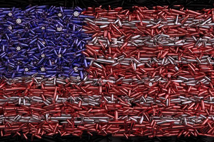 Ilustración de una bandera de Estados Unidos compuesta por balas, con los colores nacionales.