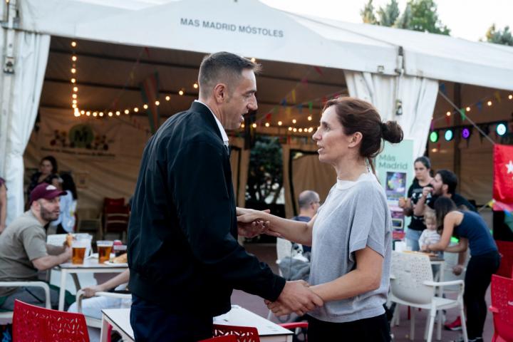 MOSTOLES MADRID, SPAIN - SEPTEMBER 13: The Minister of Health, Monica Garcia and the deputy of Mas Madrid, Emilio Delgado visit the stand of Mas Madrid at the festivities of Mostoles, on 13 September, 2024 in Mostoles, Madrid, Spain. The Patron Saint Festivities of Mostoles have been declared of Regional Tourist Interest since 2010 and are dedicated to the Virgin of the Saints, which this year celebrates its V Centenary. As usual, booths of political parties participate in the festivities of several municipalities of the Community of Madrid, as is the case of Mostoles, where the Minister of Health comes to chat with the Deputy spokesman of Mas Madrid in the Assembly of Madrid and Councilman in Mostoles. (Photo By A. Perez Meca/Europa Press via Getty Images)