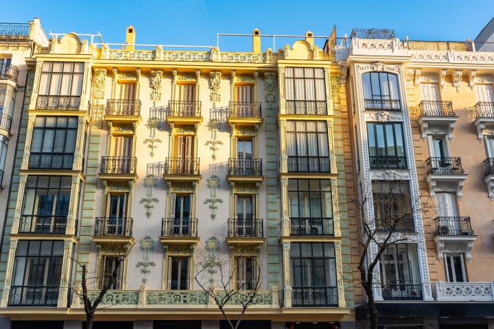 Facades of classic buildings of beautiful architecture on Calle Goya in Madrid, Salamanca district