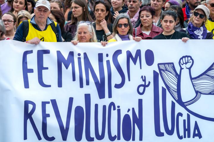 Protesters hold a banner saying ''feminism, revolution and struggle'' during the International Women's Day demonstration in Santander, Spain. (Photo by Celestino Arce/NurPhoto via Getty Images)