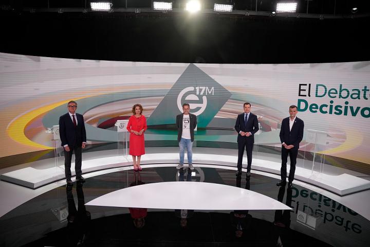 SEVILLE ANDALUSIA,, SPAIN - MAY 11: The five candidates for the Presidency of the Junta de Andalucia, the PP-A president and current president of the Junta, Juanma Moreno (2r); the secretary general of the PSOE-A, Maria Jesus Montero (2l); the spokesman of the Vox parliamentary group, Manuel Gavira (1l); the federal coordinator of Izquierda Unida (IU), Por Andalucia, Antonio Maillo (1r); and the parliamentary spokesman for Adelante Andalucia, Jose Ignacio Garcia (c); pose in a photo before facing each other in the second five-way debate to be held in the week of the elections. On 11 May 2026 in Seville (Andalusia, Spain).  This Monday, 11 May, Radio Television de Andalucia (RTVA) is organising the second televised electoral debate in the run-up to the regional elections on 17 May. A debate in which the five candidates for the presidency of the Andalusian regional government from the parties represented in the Andalusian Parliament will take part. The PP-A will be represented by the candidate for re-election as head of the regional government, Juanma Moreno; for the PSOE-A, its secretary general, Maria Jesus Montero; for Vox, its parliamentary spokesman, Manuel Gavira; for the Por Andalucia coalition, the federal coordinator of Izquierda Unida (IU), Antonio Maillo; and for Adelante Andalucia, its spokesman, Jose Ignacio Garcia. (Photo By Joaquin Corchero/Europa Press via Getty Images)