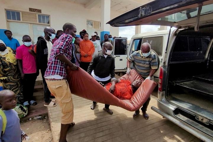 A man is carried from an ambulance as he arrives at Bunia General Referral Hospital following confirmation of an Ebola outbreak involving the Bundibugyo strain in Bunia, Ituri province, Democratic Republic of Congo, May 16, 2026. Picture taken with a mobile phone. REUTERS/Victoire Mukenge