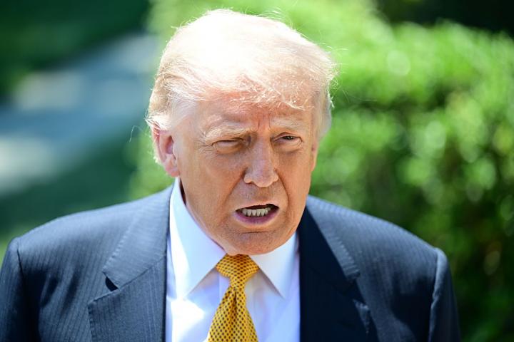 WASHINGTON, UNITED STATES - MAY 12: U.S. President Donald Trump speaks to members of the press before boarding Marine One on the South Lawn of the White House in Washington, United States, on May 12, 2026. (Photo by Kyle Mazza/Anadolu via Getty Images)