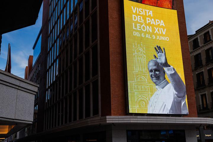MADRID, SPAIN - JUNE 04: Illuminated screens depicting Pope Leo XIV on June 04, 2026 in Madrid, Spain. Pope Leo XIV will make a trip to Spain from June 6-12, with stops in Madrid, Barcelona and the Canary Islands.  (Photo by Dan Kitwood/Getty Images)