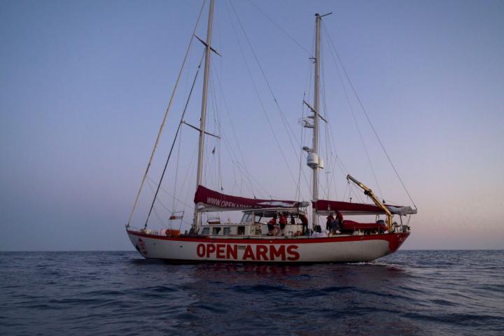 ITALY - 2022/05/18: The sailing boat Astral seen in SAR Zone. The crew of Astral sailboat, of the Spanish NGO Open Arms, carried out a rescue for nearly 70 women and men in Italian Sar Zone. The Italian Coast Guard (Guardia Costiera Italiana) arrived to take people on board. (Photo by Valeria Ferraro/SOPA Images/LightRocket via Getty Images)