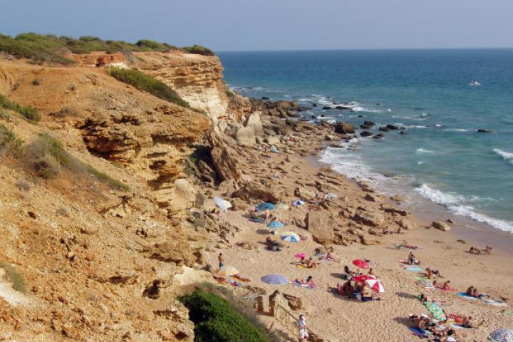 alt="alt="Cove in the town of Conil de la Frontera, Cadiz, Andalucia, Spain, July 2006. (Photo by Cristina Arias/Cover/Getty Images)""